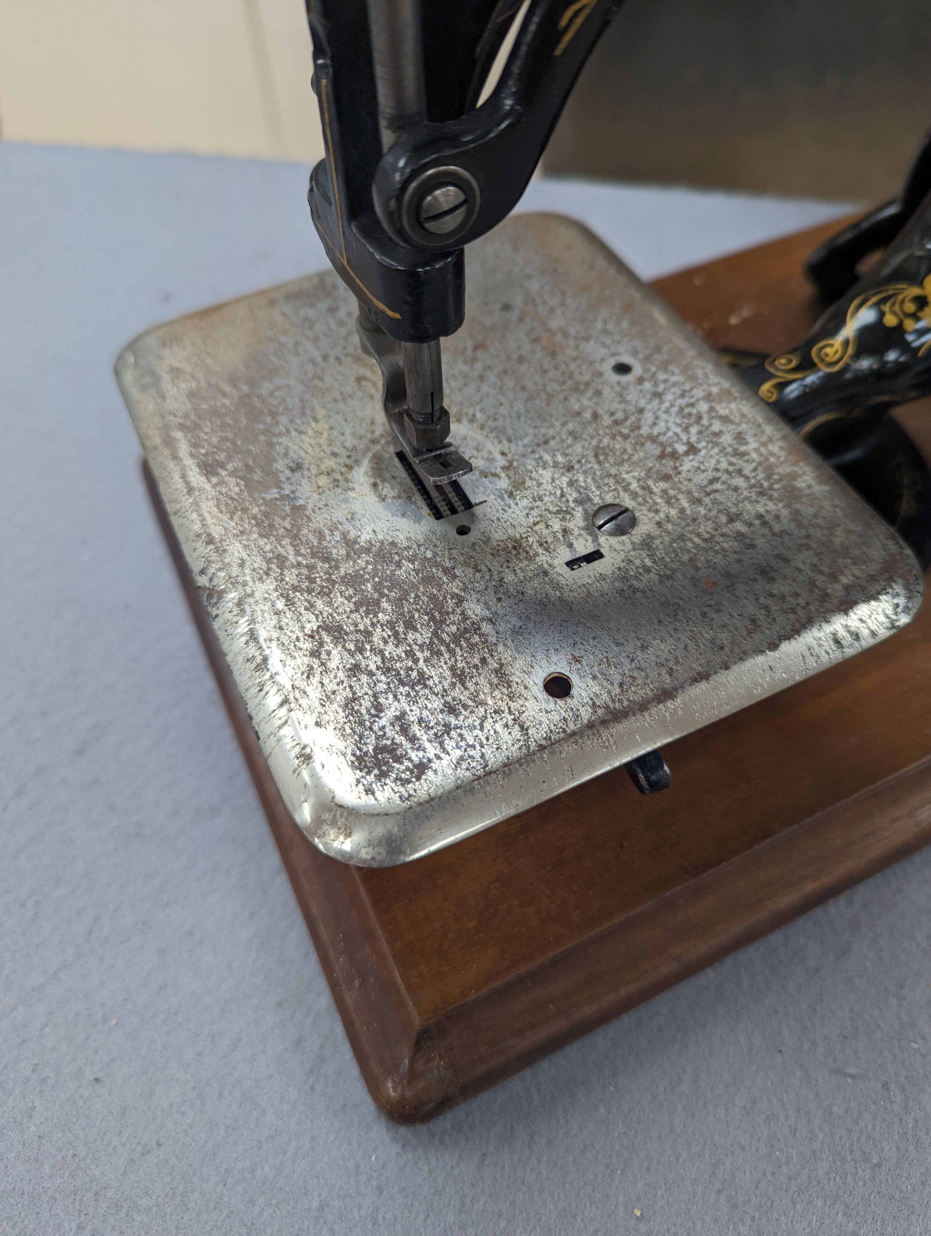 A Victorian sewing machine, Corona typewriter and two microscopes